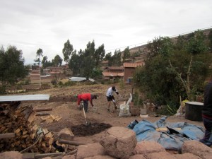 Cleaning bricks and shovelling mud!